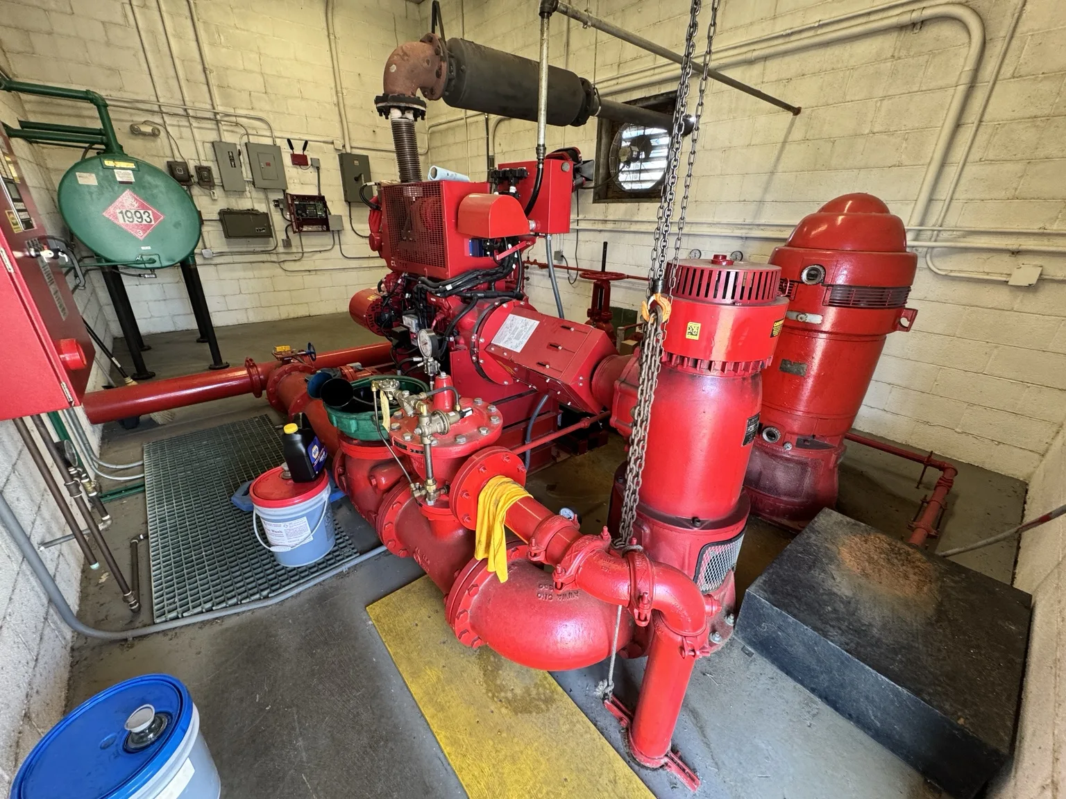 Preventive maintenance on a fire pump supplying reservoir water to a building’s fire-protection system.